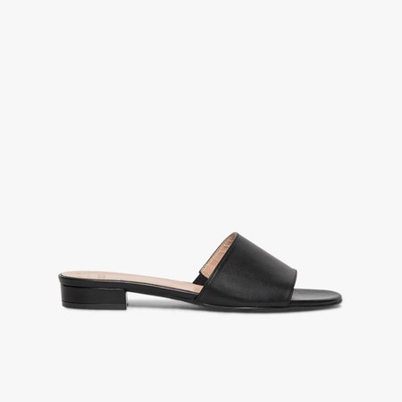 black leather flat mules with open toe