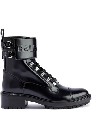 Embossed glossed-leather ankle boots | BALMAIN | Sale up to 70% off | THE OUTNET
