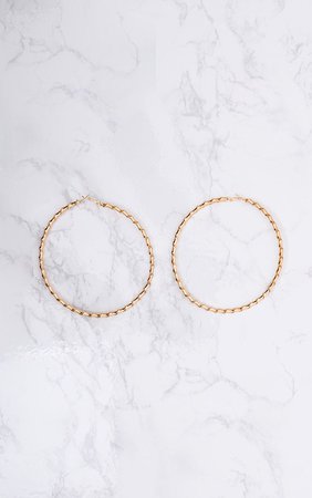Brynn Gold Big Twisted Metal Hoop Earrings | PrettyLittleThing