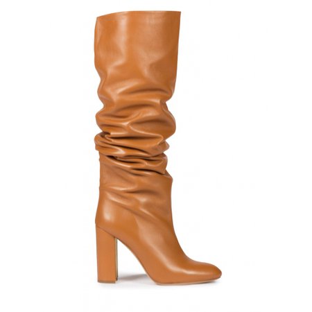 Slouchy knee-high block heel boots in camel leather . PURA LOPEZ