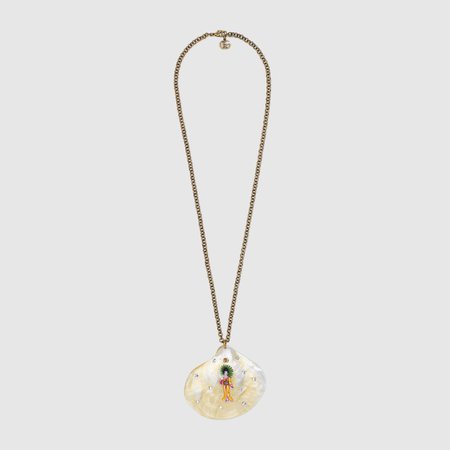 Necklace with shell pendant and aged gold finish