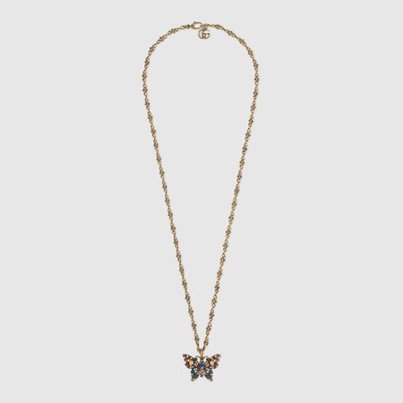 Crystal studded butterfly necklace with aged gold finish