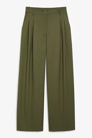 Wide leg pleated trousers - Khaki green - Trousers & shorts - Monki WW