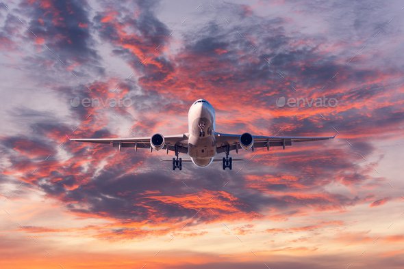 irplane at colorful sunset