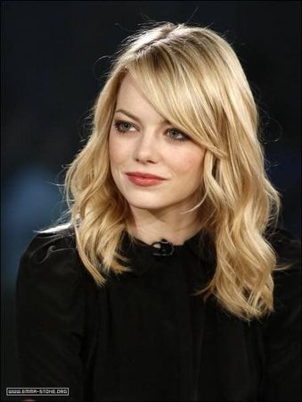 Side-Swept Bangs and Loose Waves