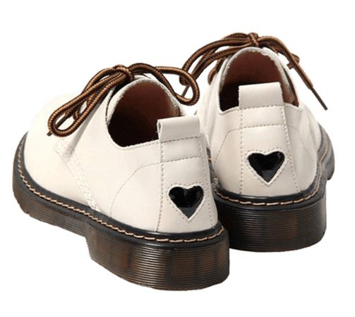 white bowling shoes with heart decal