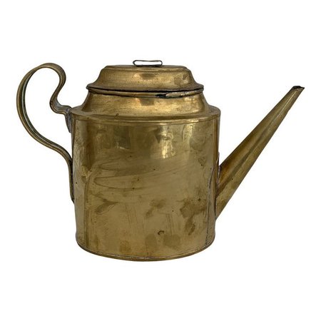brass watering can