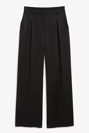 Wide leg pleated trousers - Black magic - Trousers & shorts - Monki WW
