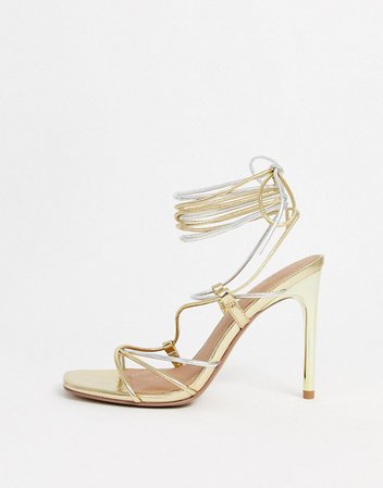 ASOS DESIGN Non Stop strappy tie leg heeled sandals in gold and silver metallic | ASOS