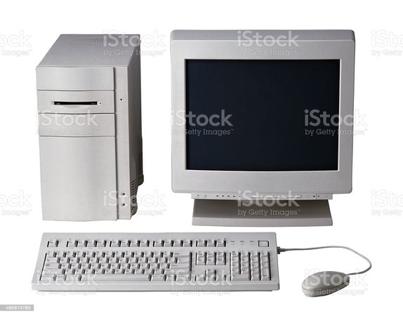 Old Desktop computer with monitor, keyboard and mouse stock photo