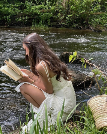reading by a lake