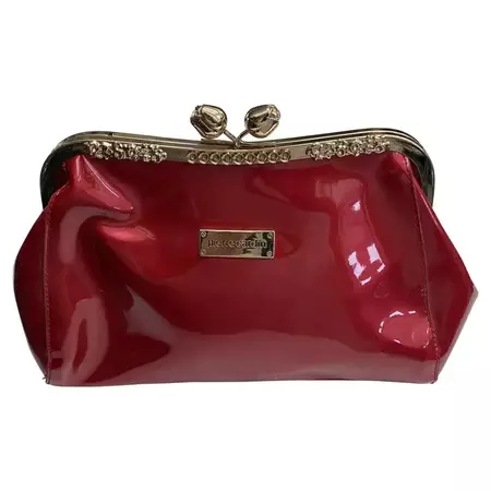 A 1980s Vintage Pierre Cardin Pink Plastic and Brass Handbag For Sale at 1stDibs