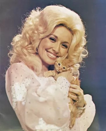 Dolly Parton holding a Kitten, 1970s. : aww