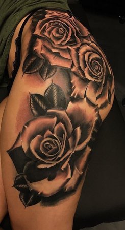 flower hip and thigh tattoo