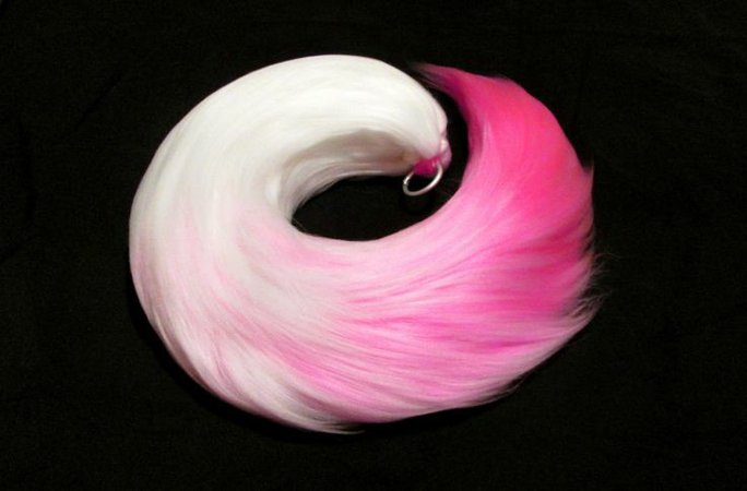 white and pink tail