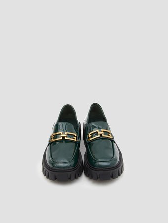 shiny green loafers