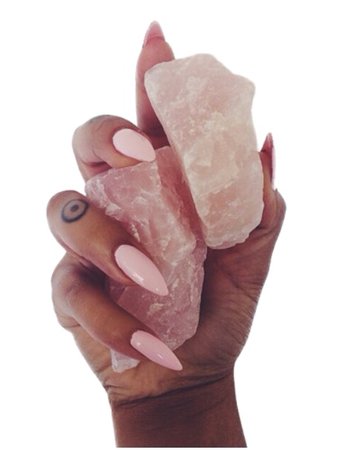 pink crystals in hand