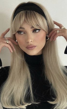 long blonde hair with black headband and curled ends