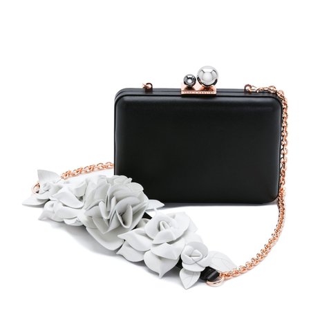 Black leather minauderie with white leather flowers