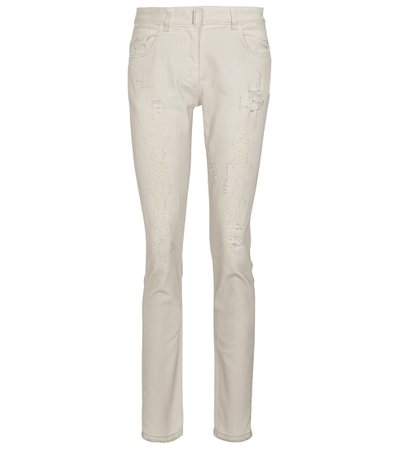 Givenchy - Distressed mid-rise skinny jeans | Mytheresa