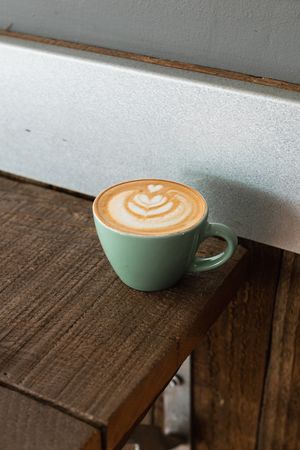 green ceramic cappuccino cup photo – Free Coffee cup Image on Unsplash