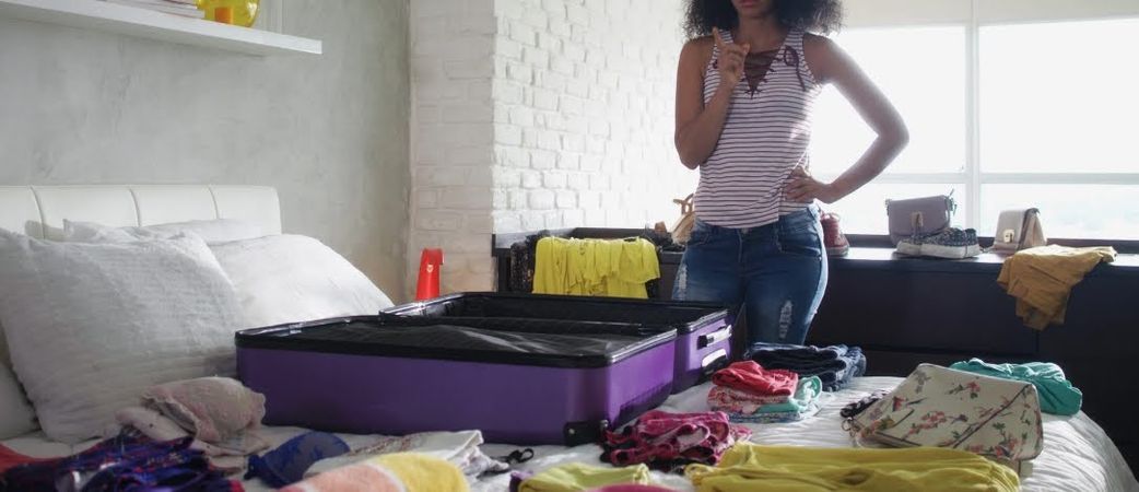 unpacking luggage black women
