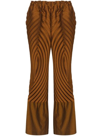 Shop Issey Miyake plissé-effect flared trousers with Express Delivery - FARFETCH