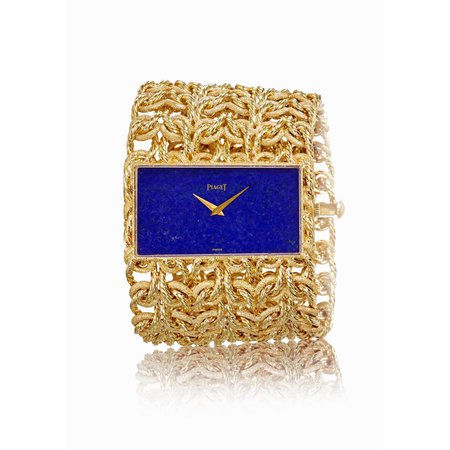 Piaget vintage cuff watch in yellow gold with a lapis lazuli