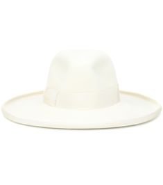 Gucci's hat makes for a glamorous addition to our warm-weather edit thanks to its fresh update in optic white. T
