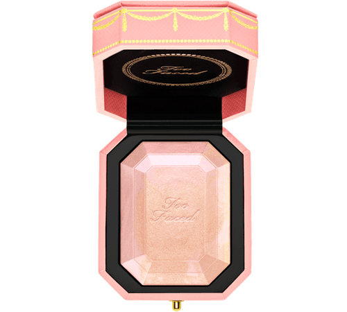 The Diamond Highlighter from Too Faced will have you sparkling with this liquid to powder formula made with real diamond. Swirl the pink, blue, and gold shades to create your custom highlighter!