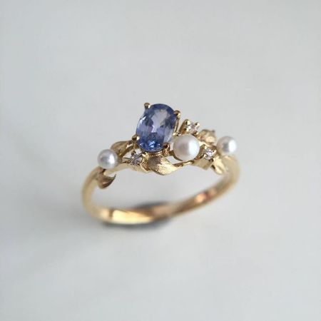 blue gold and pearl ring