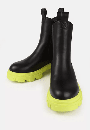 black chunky boots with lime green sole
