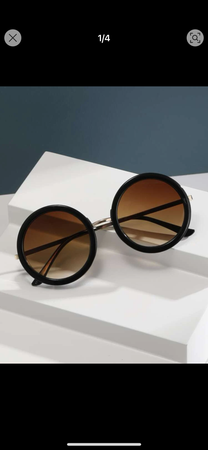 round black thick framed sunglasses