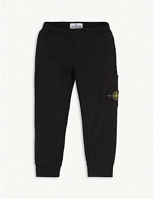 STONE ISLAND - Brand-patch slim-leg stretch-cotton trousers | Selfridges.com