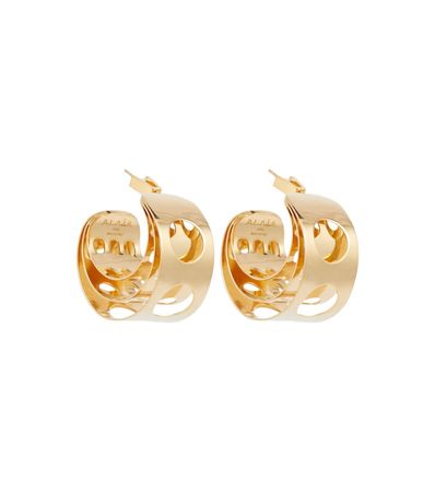 Alaïa - Cutout hoop earrings | Mytheresa