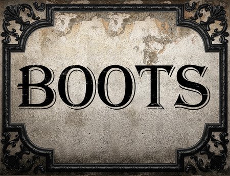 Boots Word On Concrette Wall Stock Photo, Picture And Royalty Free Image. Image 51576359.