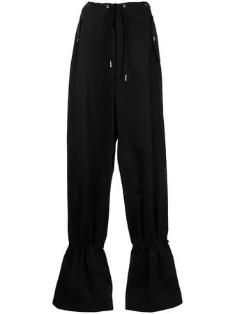 Shop Dion Lee eyelet tie tapered trousers with Express Delivery - FARFETCH