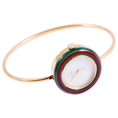 1970s Gucci Gold plated Bangle Watch Multicolor Interchangeable Bezels at 1stDibs | gucci bezel bangle watch