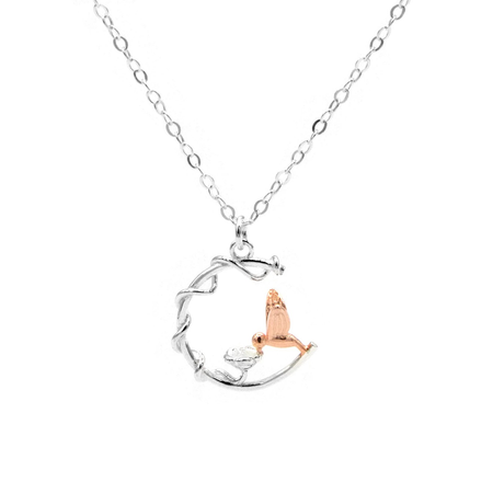 silver crescent moon and bird necklace