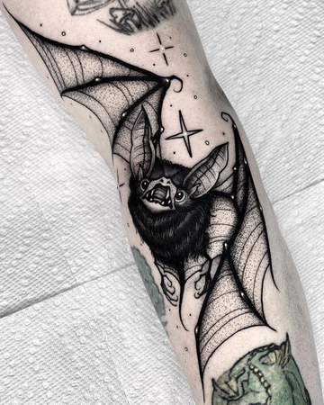 Tall skinny bat minimal detail tattoo idea | TattoosAI