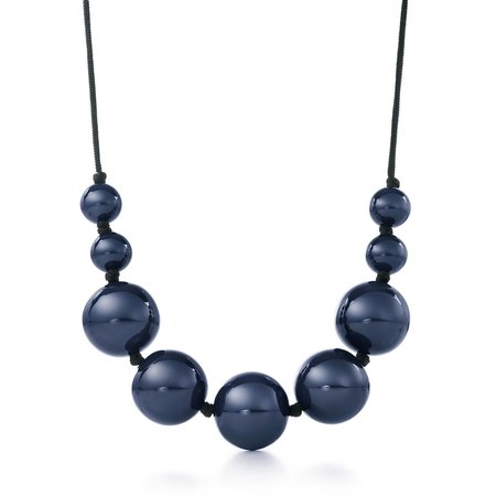 Elsa Peretti® Sphere necklace in blue lacquer over Japanese hardwood. | Tiffany & Co.