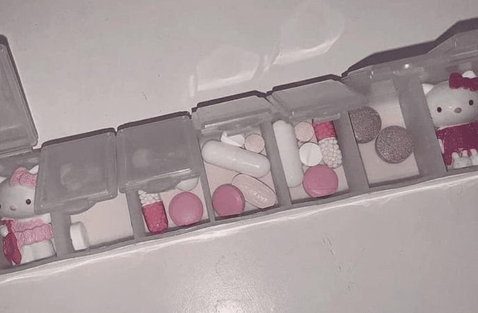 pink themed pill case