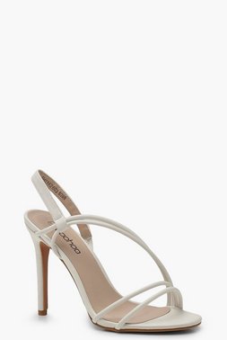 Asymmetric white heels