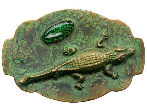 Arts and crafts alligator sash pin, circa 1910. (Via)