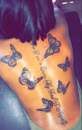 butterfly back tattoo with quote