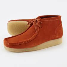 black boots and rust orange - Google Search