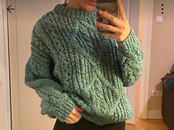 green wool sweater