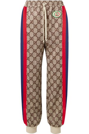 Gucci | Appliquéd striped printed tech-jersey track pants | NET-A-PORTER.COM