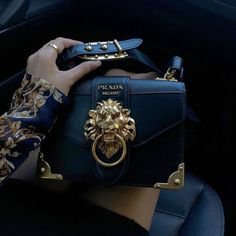 Dark Blue Prada handbag/w Lion