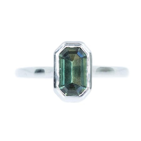 1.62CT GREEN EMERALD CUT SAPPHIRE RING IN CONTEMPORARY WHITE GOLD BEZEL SETTING BY Anueva Jewelry